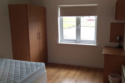 Thomond Village single bed bed room